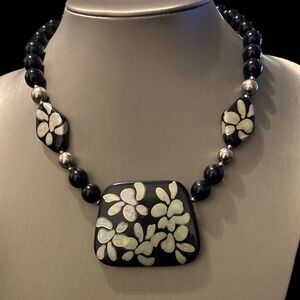 Mother of Pearl Inlay on Black Wood